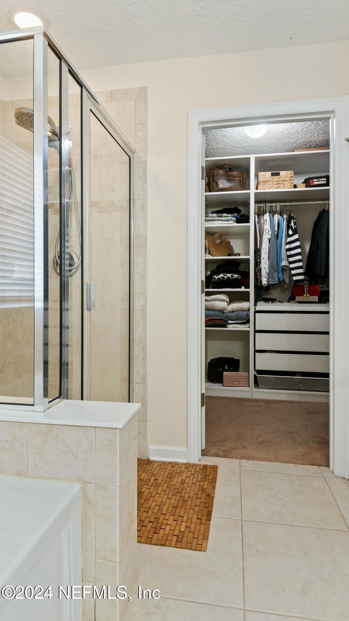 3842 Chasing Falls Road Orange Park, FL 32065 - Photo 27 of 33 Master bath view towards walk-in closet