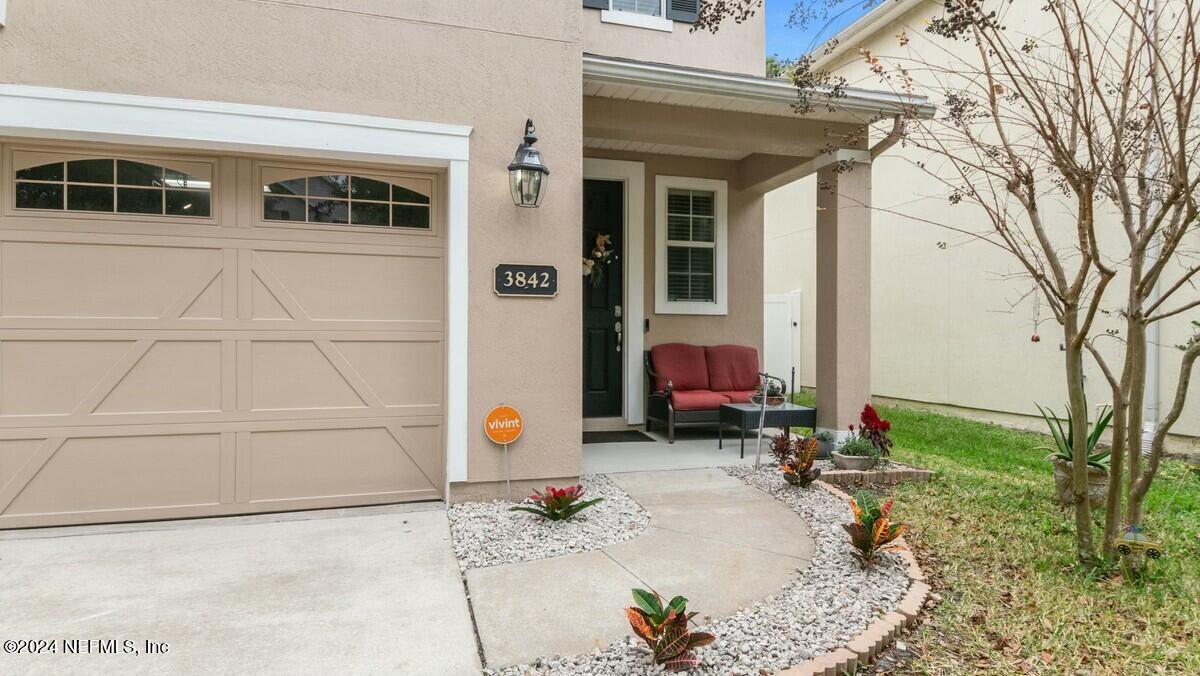 3842 Chasing Falls Road Orange Park, FL 32065 - Photo 3 of 33 Garage & covered porch