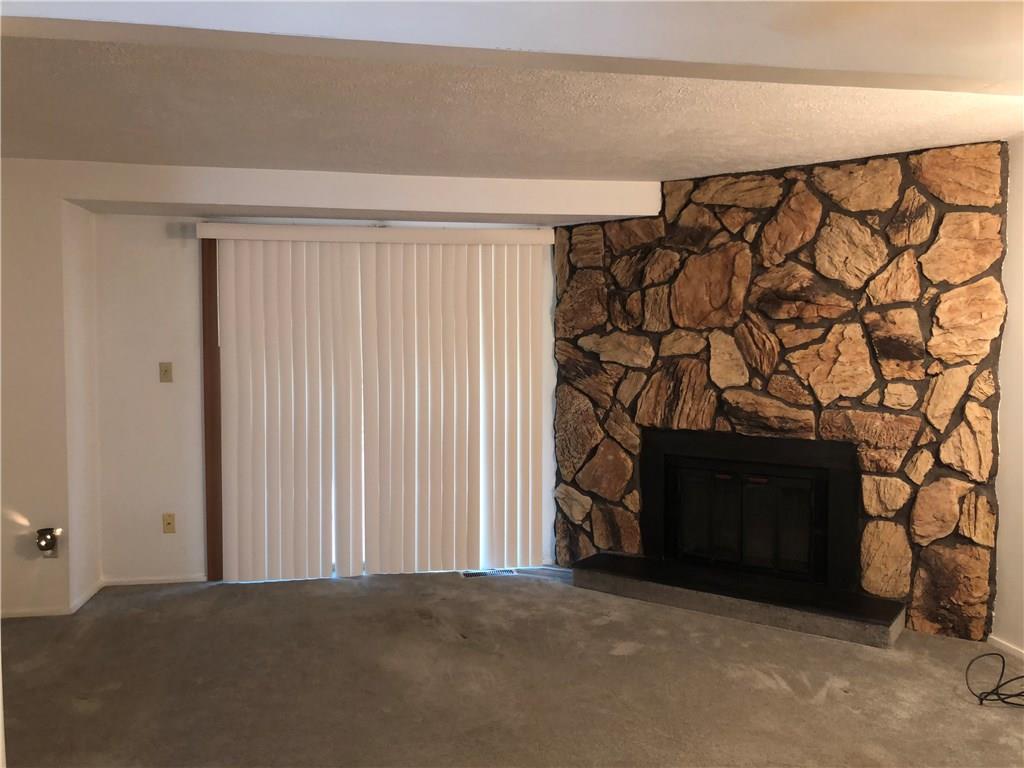 222 Shady Ridge Drive Monroeville, PA 15146 - Photo 3 of 17 Living room with stone fireplace