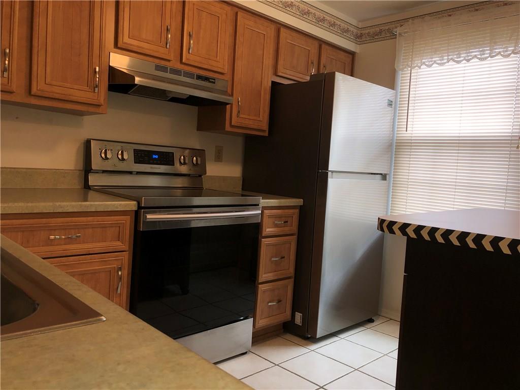 222 Shady Ridge Drive Monroeville, PA 15146 - Photo 6 of 17 Updated Kitchen with Newer Stove and Refrigerator
