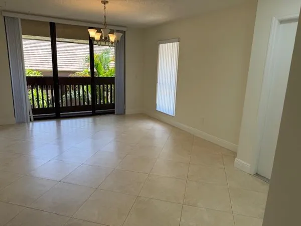 a view of hallway with furniture