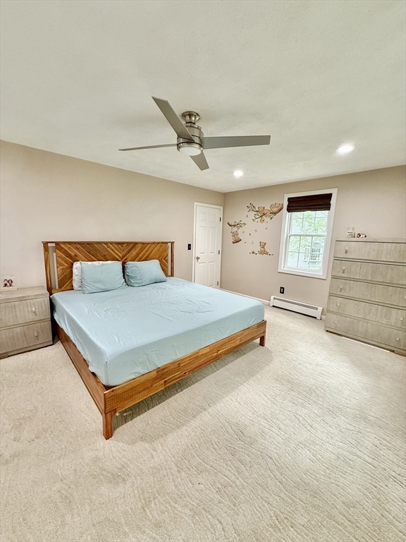 25 Homeward Lane, Unit 25 Natick, MA 01760 - Photo 10 of 16 a bedroom with a bed and window