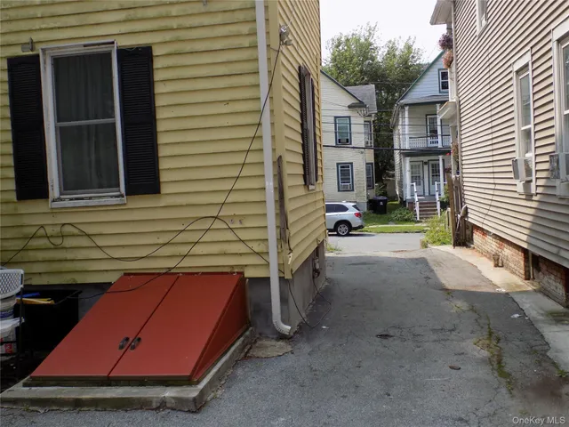 a backyard of a house with seating space