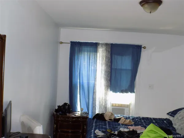 a room with furniture and a window