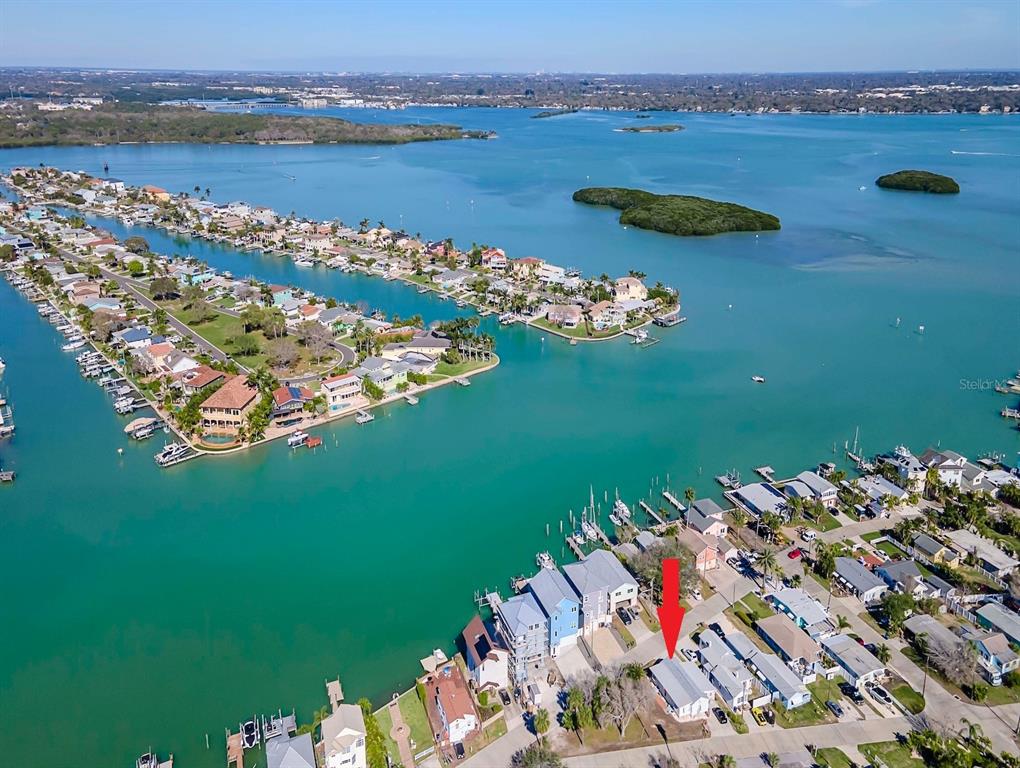 13230 Boca Ciega Avenue Madeira Beach, FL 33708 - Photo 3 of 7 a view of a lake with a mountain