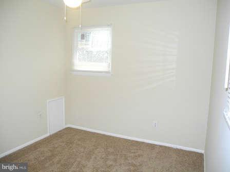 323 Leyton Road Reisterstown, MD 21136 - Photo 17 of 29 an empty room with a window