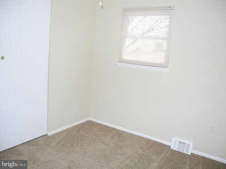 323 Leyton Road Reisterstown, MD 21136 - Photo 18 of 29 an empty room with a window