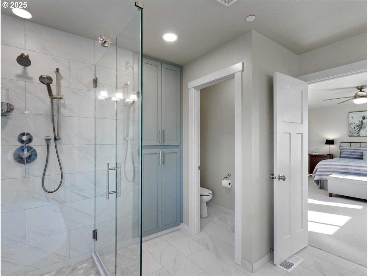 6684 North 89th Loop Camas, WA 98607 - Photo 29 of 44 a bathroom with a shower and a sink