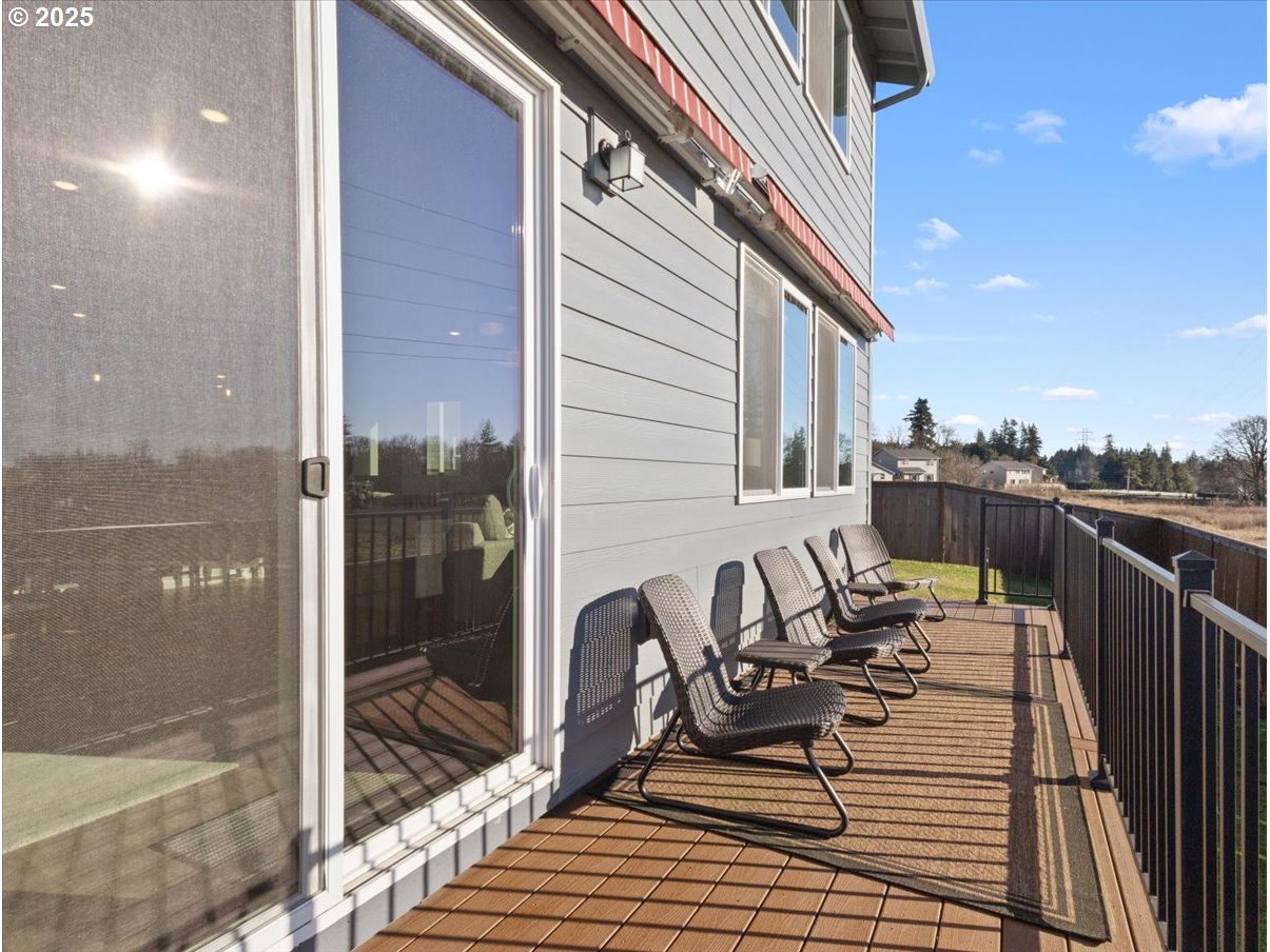 6684 North 89th Loop Camas, WA 98607 - Photo 33 of 44 a view of a balcony with chairs