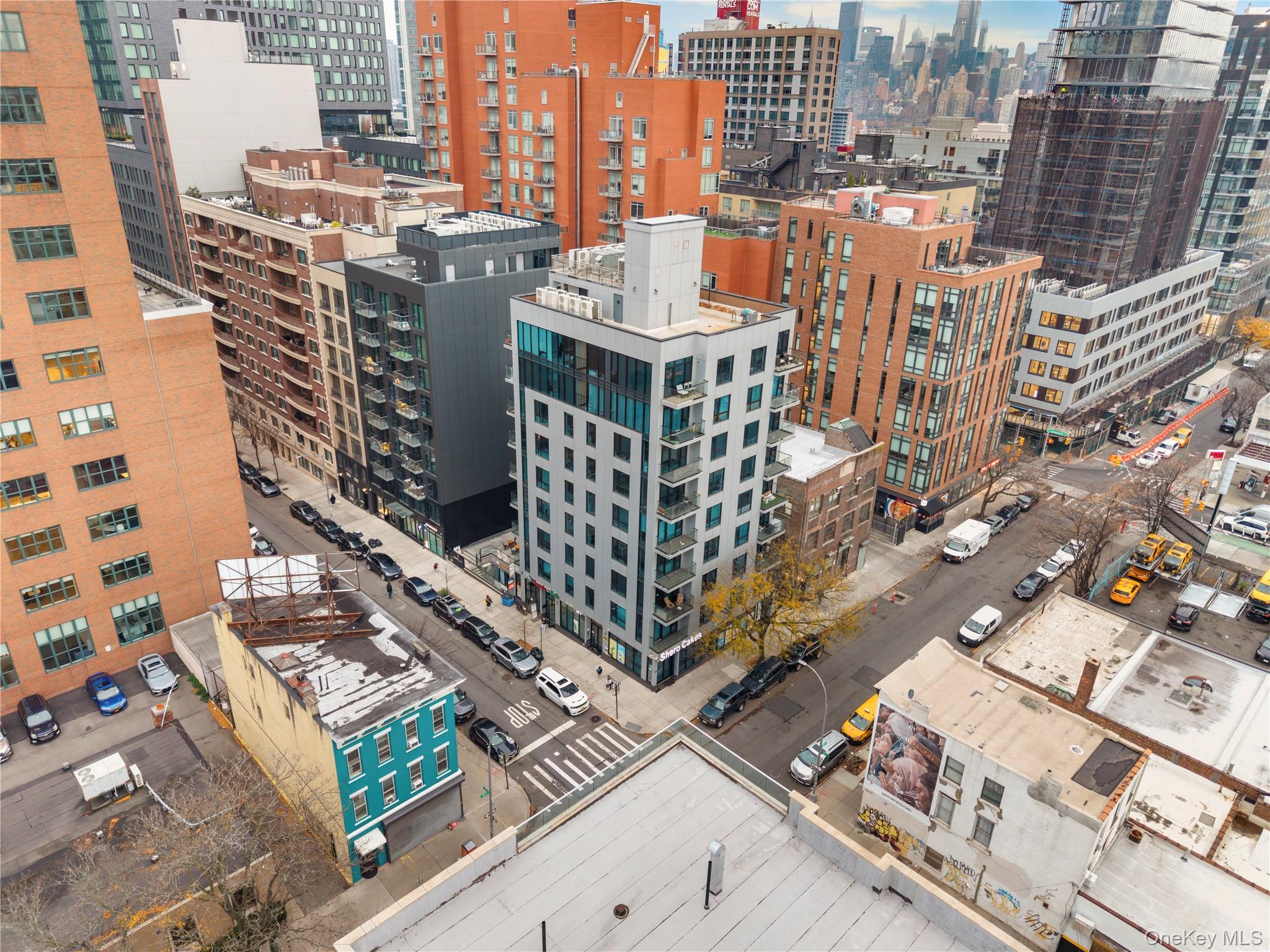 41-04 27th Street, Unit 7A Queens, NY 11101 - Photo 15 of 17 a city view with tall buildings