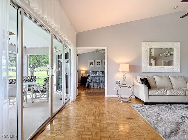 a living room with furniture and a table