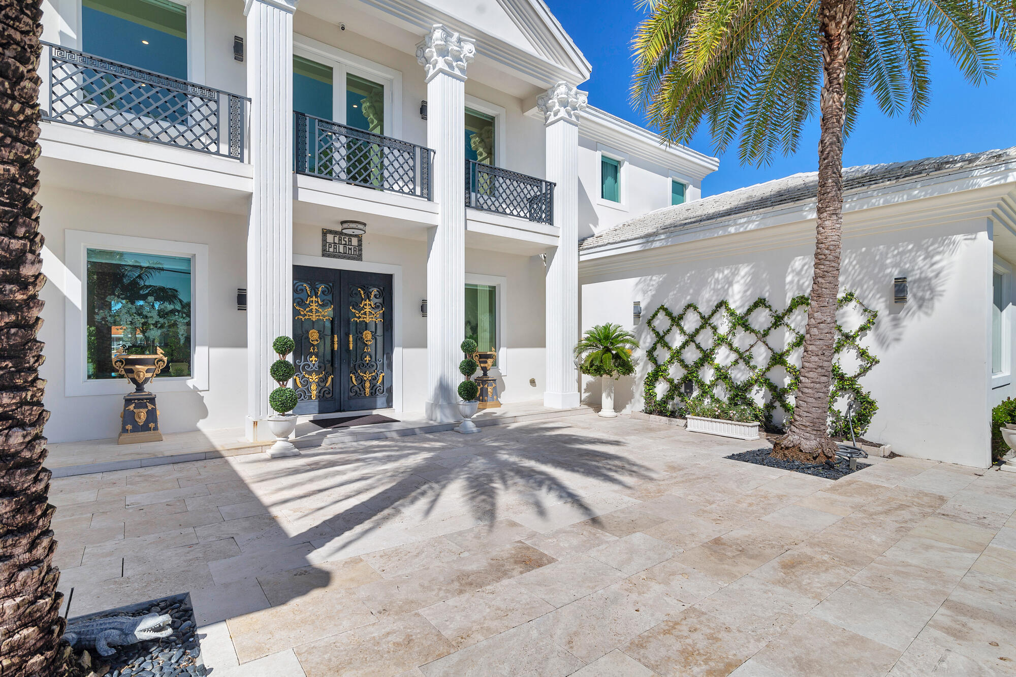 7923 Pine Tree Lane Lake Clarke Shores, FL 33406 - Photo 13 of 70 a view of a house with a patio