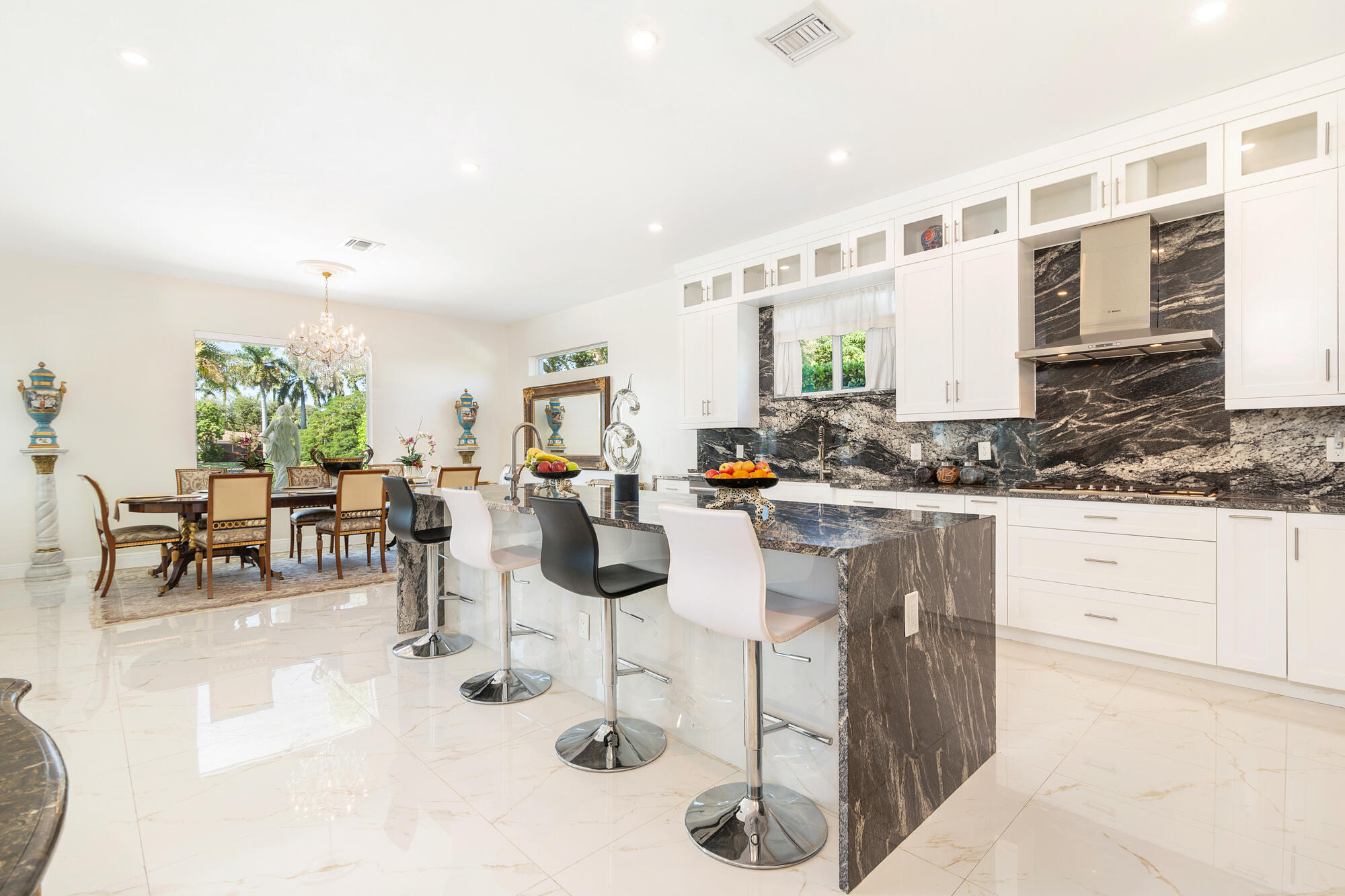 7923 Pine Tree Lane Lake Clarke Shores, FL 33406 - Photo 25 of 70 a living room with furniture and view of kitchen