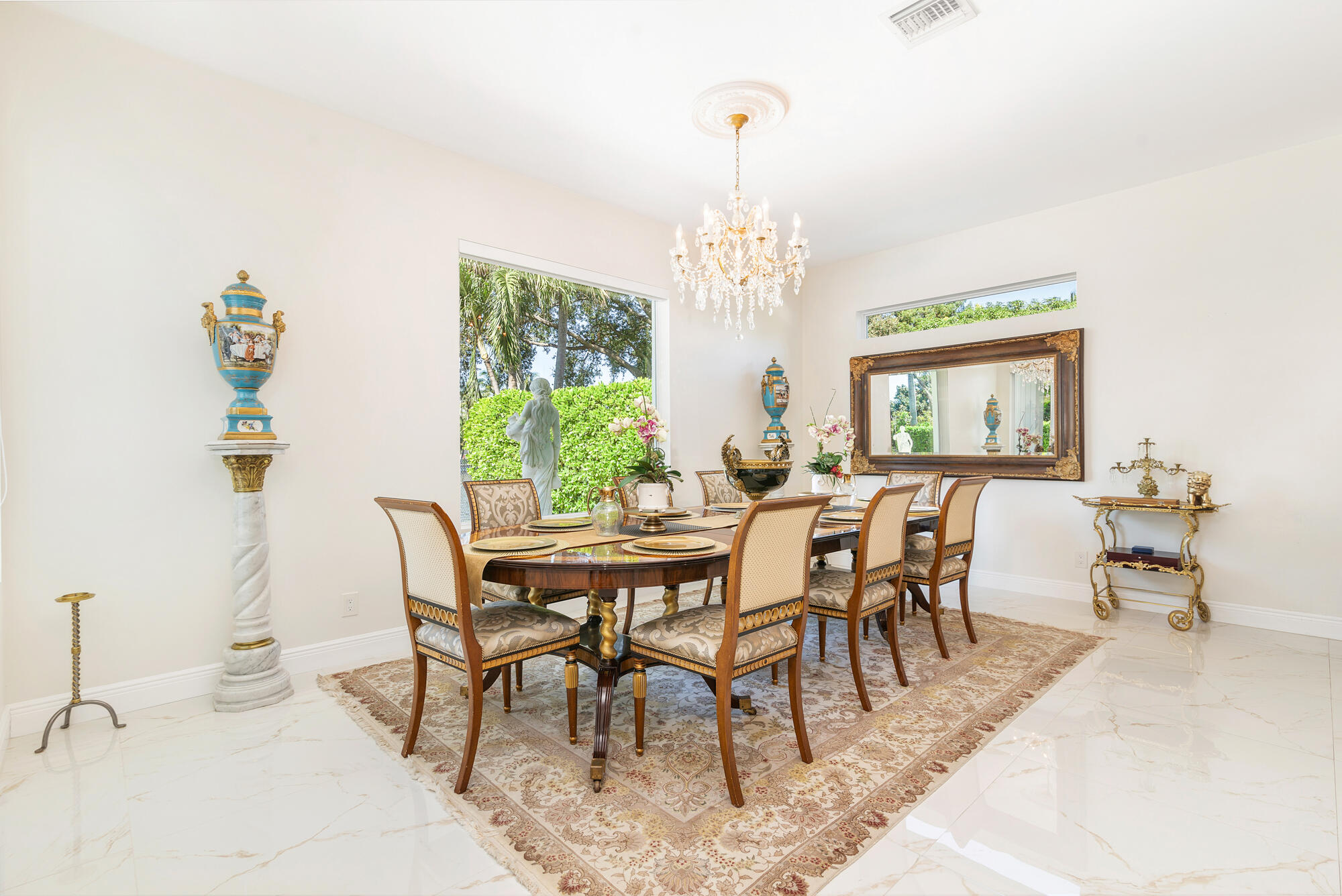 7923 Pine Tree Lane Lake Clarke Shores, FL 33406 - Photo 26 of 70 a view of a dining room with furniture window and outside view