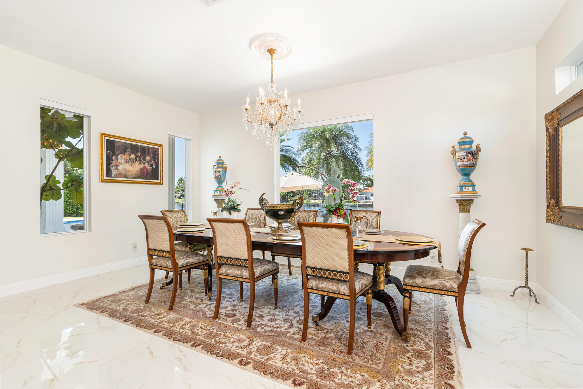 7923 Pine Tree Lane Lake Clarke Shores, FL 33406 - Photo 27 of 70 a view of a dining room with furniture