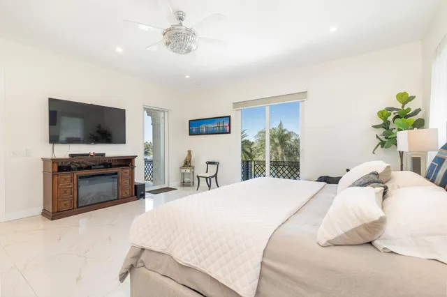 a bedroom with a bed and a couch