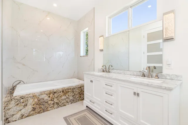 a bathroom with a toilet and shower