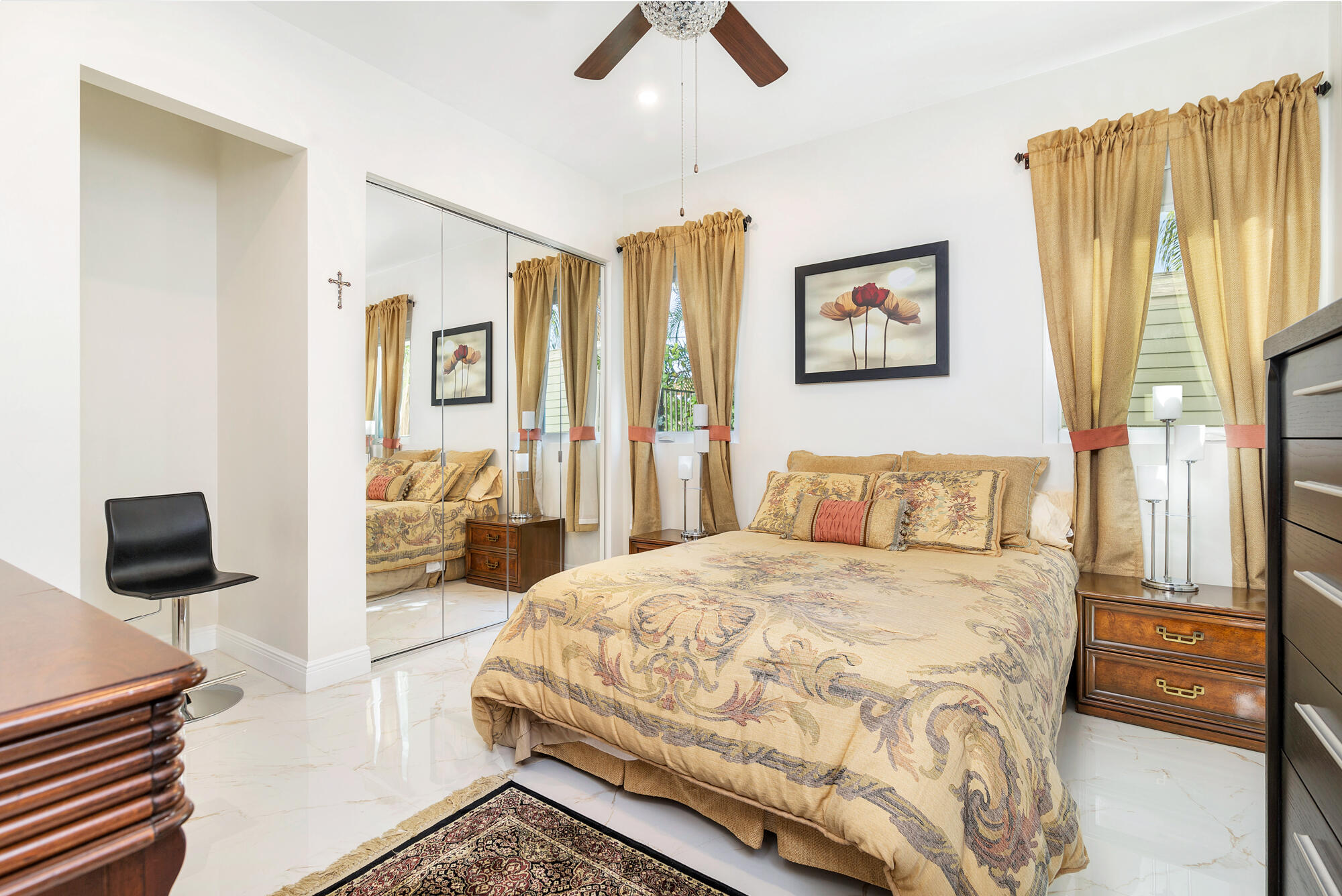 7923 Pine Tree Lane Lake Clarke Shores, FL 33406 - Photo 43 of 70 a bedroom with a bed and a couch