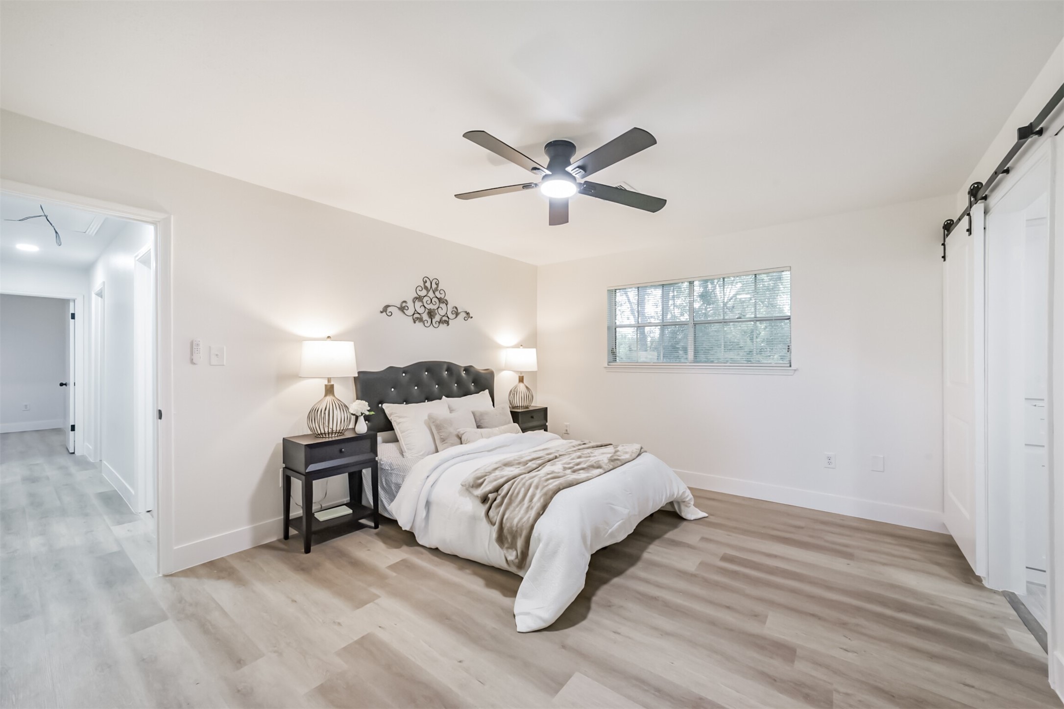 5403 Croix Road Manvel, TX 77578 - Photo 21 of 25 Primary bedroom has plenty of space for large furniture and additional seating.
