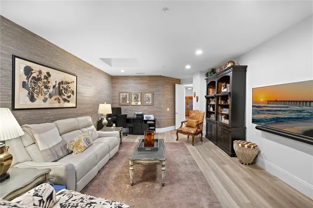 a view of a swimming pool with an outdoor space and seating area