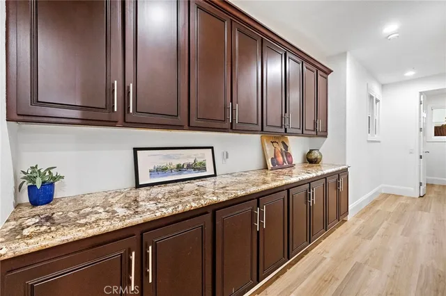 a view of a swimming pool with outdoor seating