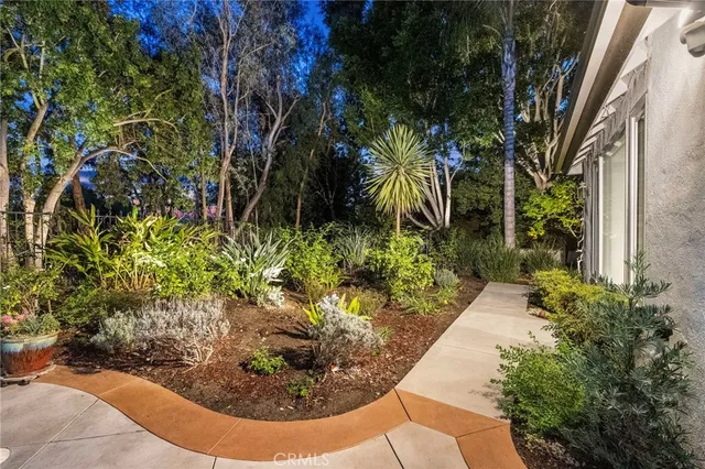 a view of a patio with swimming pool table and chairs