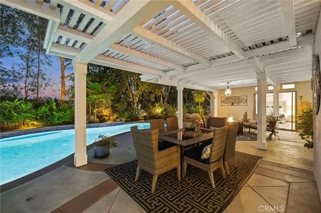 a bathroom with a granite countertop sink mirror and toilet