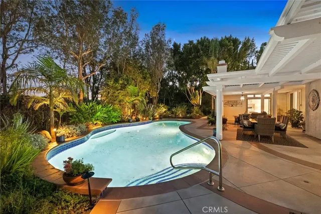 a spacious bedroom with a bed and a table