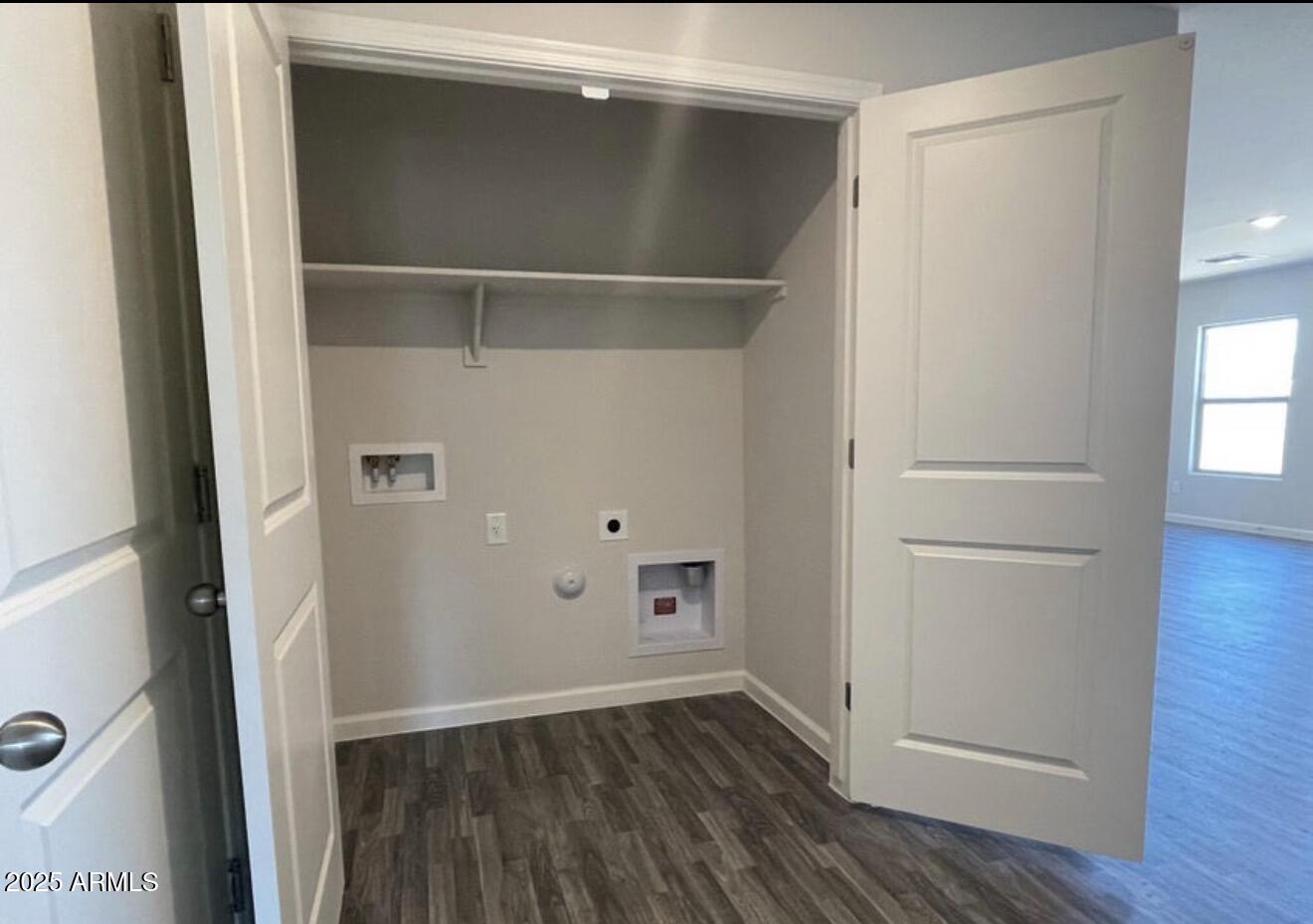 251 South Picacho Heights Road Eloy, AZ 85131 - Photo 8 of 19 a view of an empty room with wooden floor