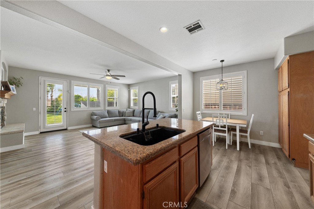 32985 Novara Court Temecula, CA 92592 - Photo 25 of 56 Open Kitchen Overlooking Main Living Areas