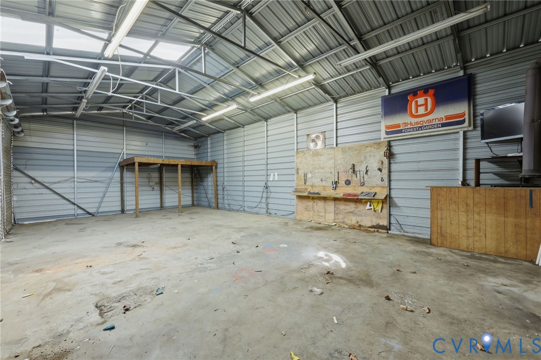 6240 Massey Road Spotsylvania, VA 22551 - Photo 26 of 42 Concrete floor, natural and artificial light.