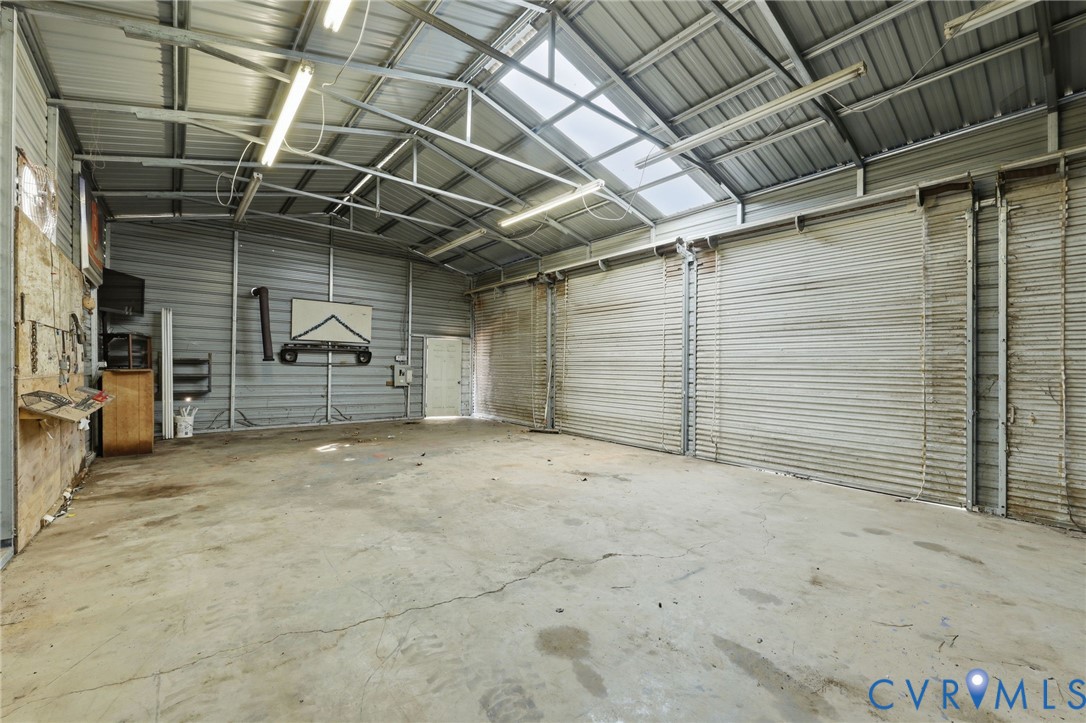 6240 Massey Road Spotsylvania, VA 22551 - Photo 27 of 42 Stove pipe and separate electrical panel.