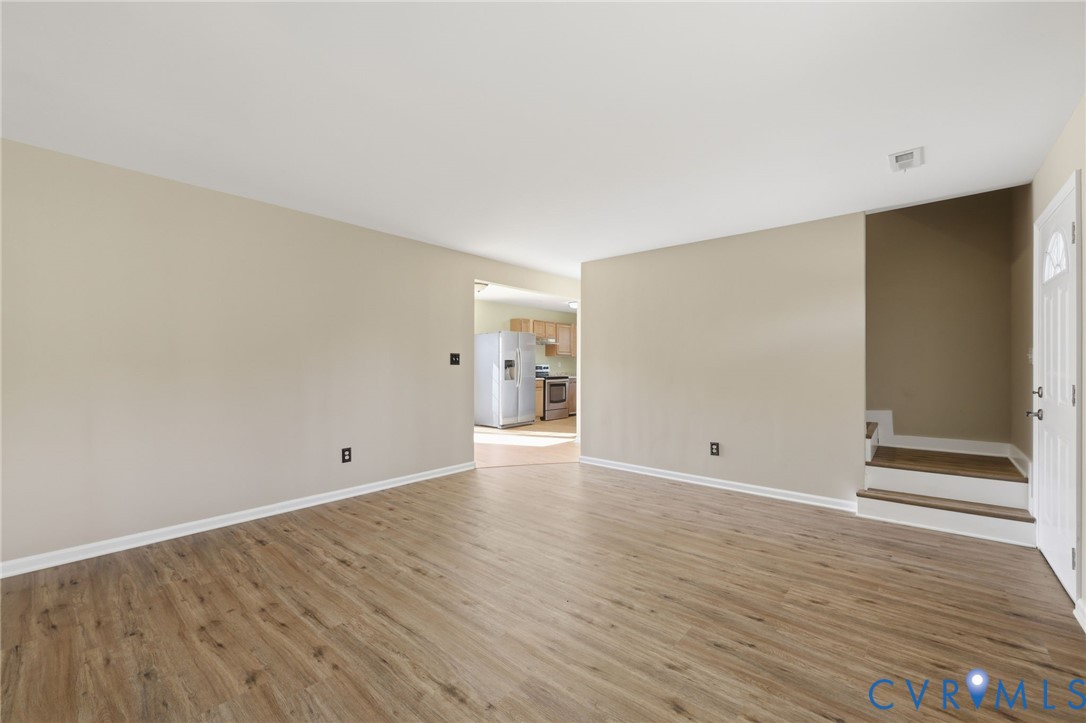 6240 Massey Road Spotsylvania, VA 22551 - Photo 5 of 42 Living room has new LVP flooring and fresh paint.