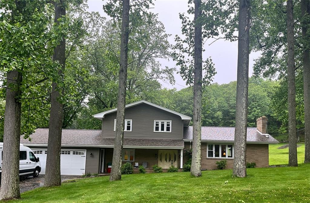 1260 Lions Health Camp Road Indiana, PA 15701 - Photo 1 of 34 a front view of a house with garden