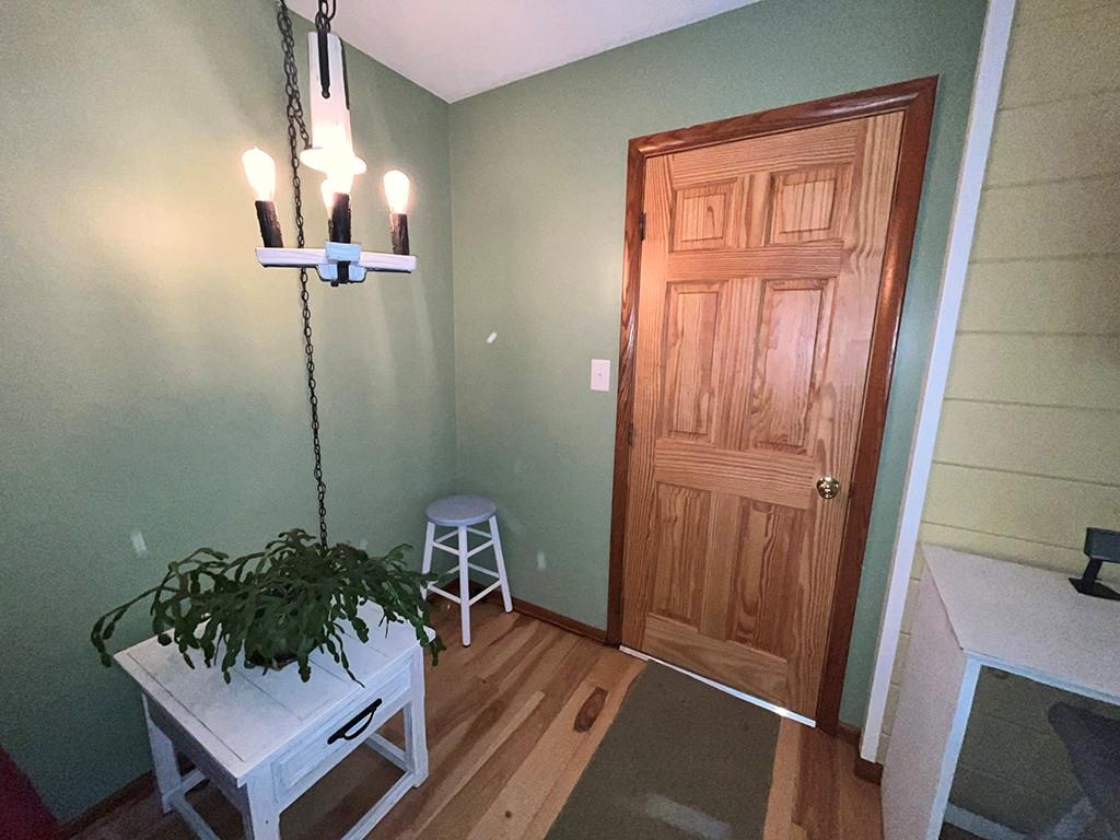 1260 Lions Health Camp Road Indiana, PA 15701 - Photo 16 of 34 a view of a hallway and a dining room with a table and chairs