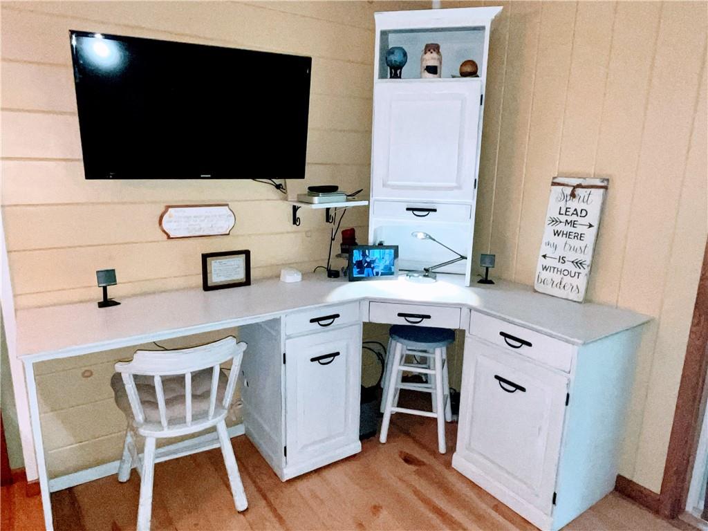 1260 Lions Health Camp Road Indiana, PA 15701 - Photo 17 of 34 a kitchen with a sink cabinets and wooden floor