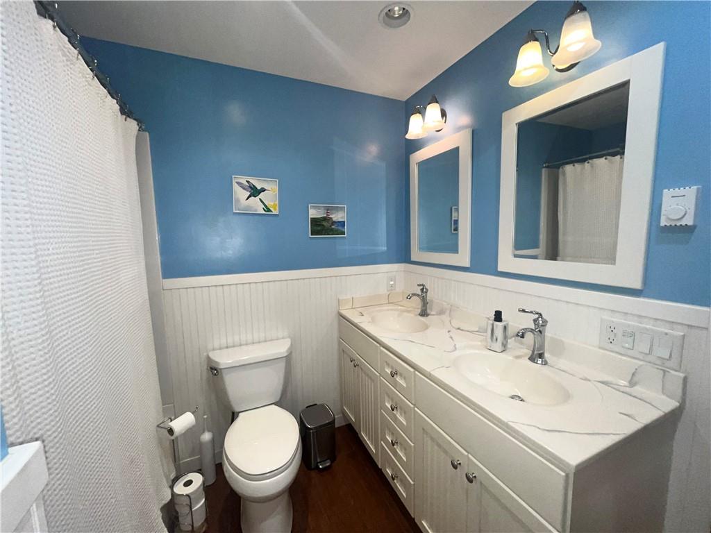 1260 Lions Health Camp Road Indiana, PA 15701 - Photo 19 of 34 a bathroom with a toilet sink and mirror