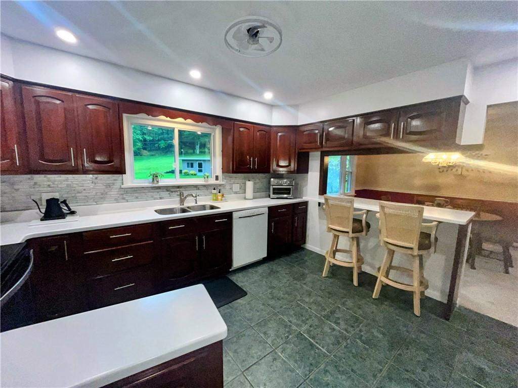 1260 Lions Health Camp Road Indiana, PA 15701 - Photo 8 of 34 a kitchen with a sink a window and appliances