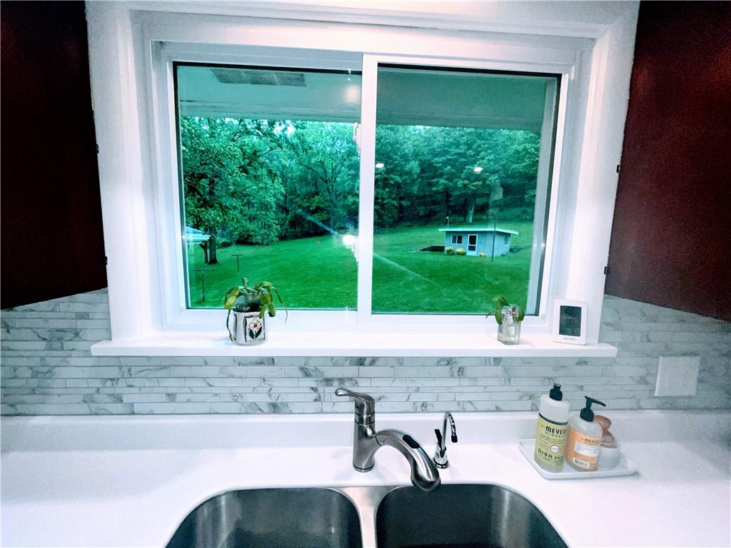 1260 Lions Health Camp Road Indiana, PA 15701 - Photo 10 of 34 a kitchen with a sink and a large window