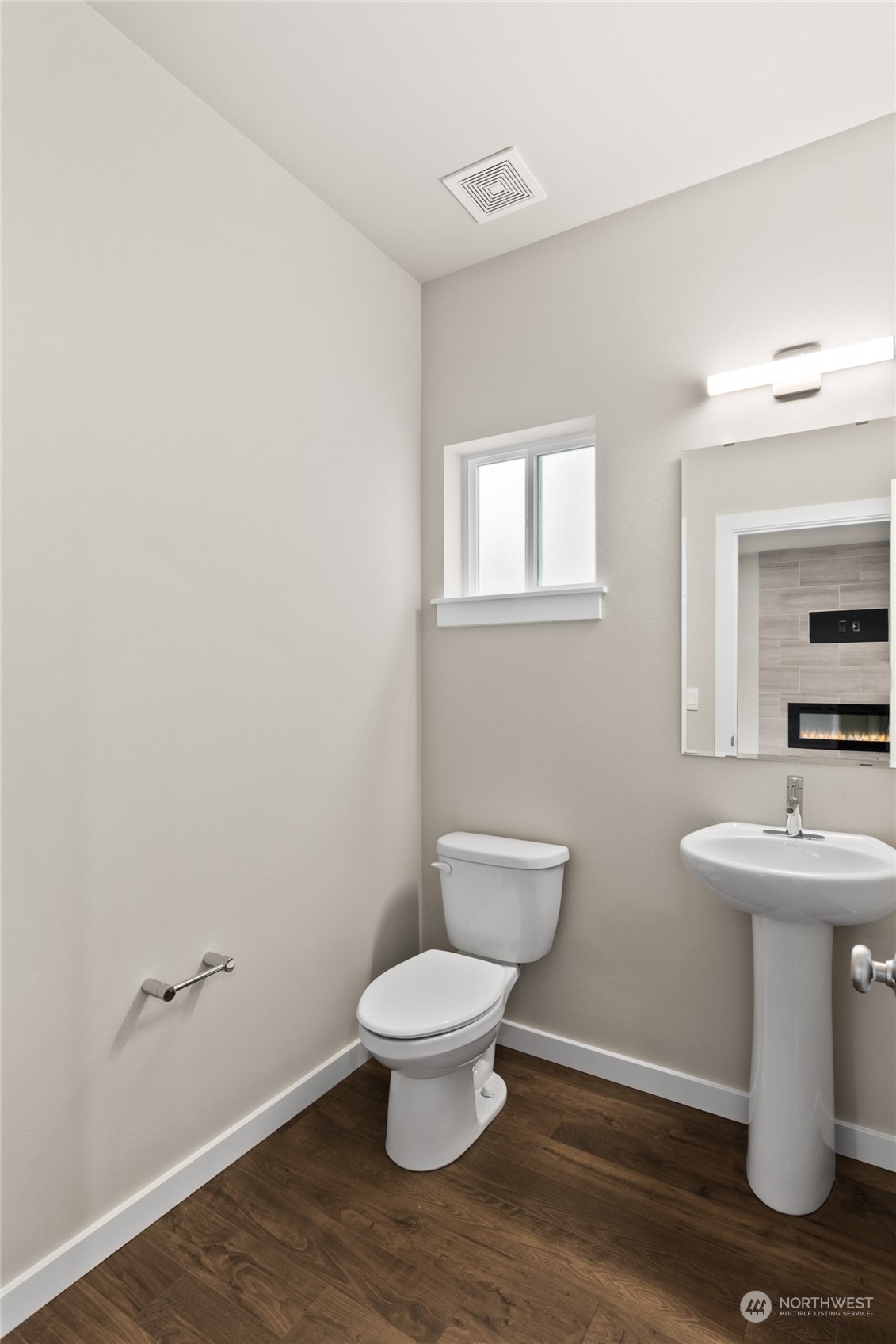 327 207th Street Southeast Bothell, WA 98012 - Photo 19 of 31 a bathroom with a toilet sink and mirror