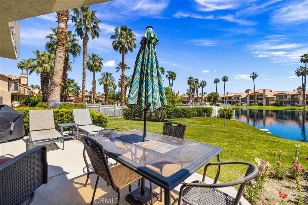 55108 Firestone La Quinta, CA 92253 - Photo 33 of 47 a view of swimming pool with outdoor seating and city view