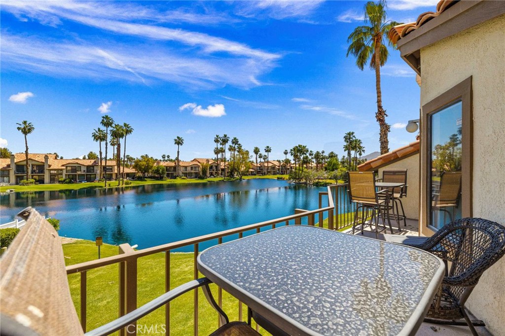 55108 Firestone La Quinta, CA 92253 - Photo 35 of 47 a view of a lake with houses