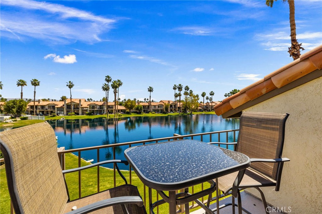 55108 Firestone La Quinta, CA 92253 - Photo 37 of 47 a view of swimming pool with outdoor seating and plants