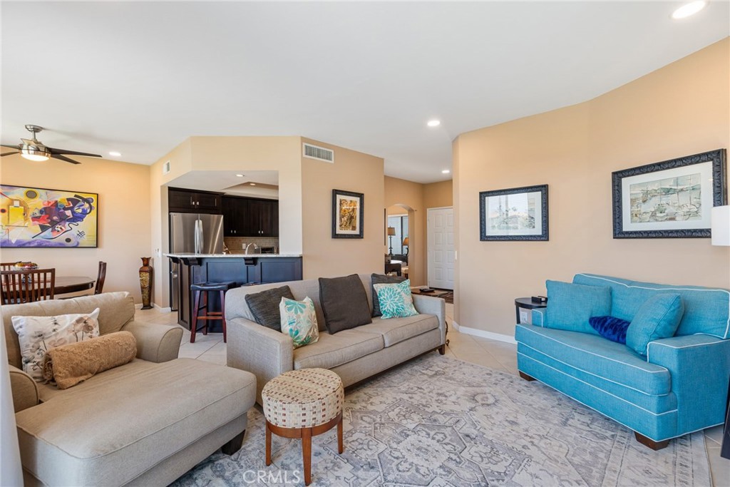 55108 Firestone La Quinta, CA 92253 - Photo 5 of 47 a living room with furniture and a couch
