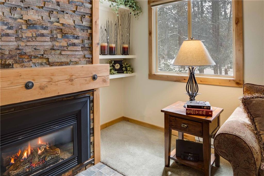 1937 Soda Ridge Road, Unit 1144 Keystone, CO 80435 - Photo 3 of 25 a kitchen with a stove and a flat screen tv