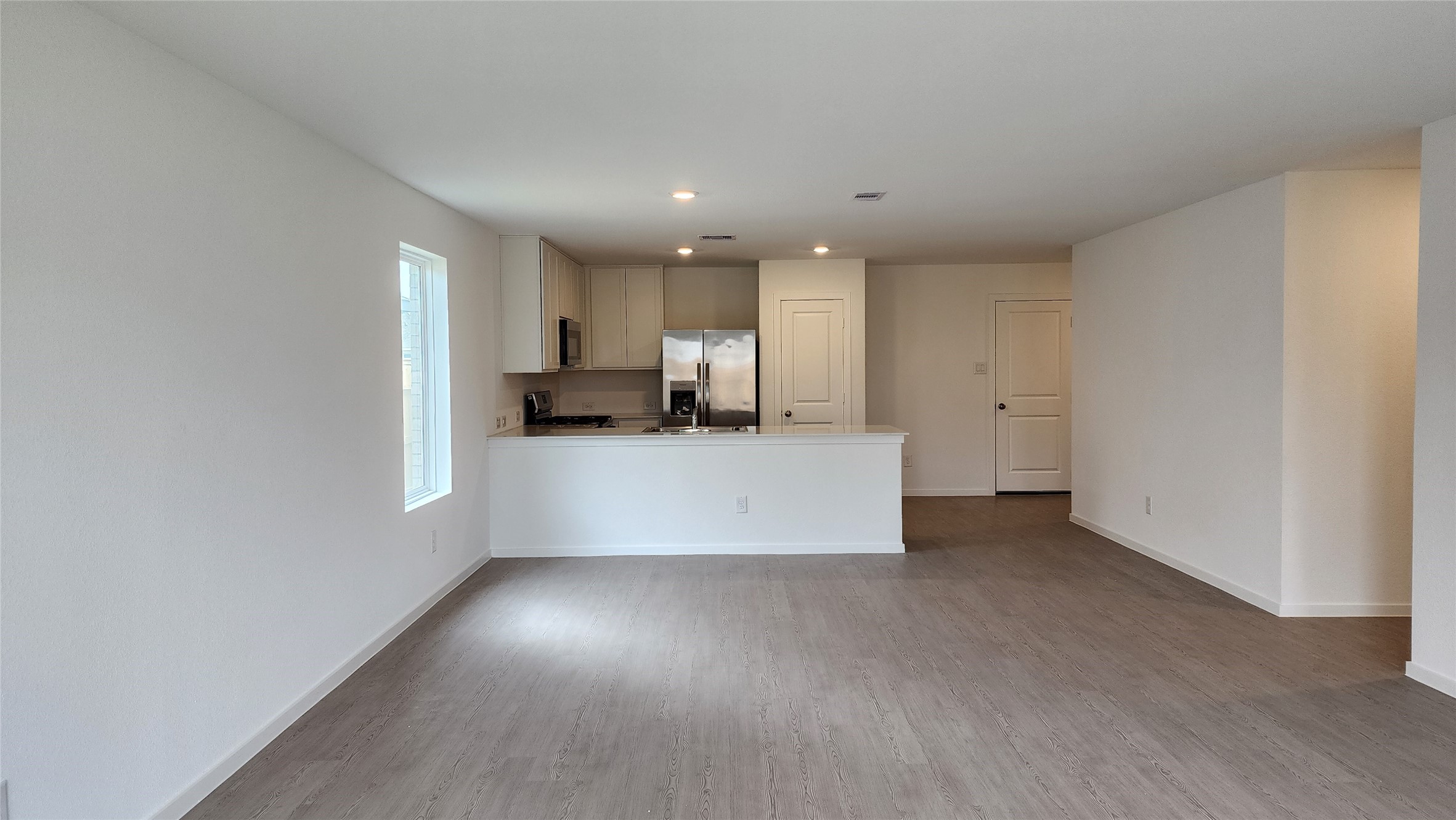 16218 Rustic Prairie Drive Hockley, TX 77447 - Photo 7 of 34 Family/Living area to Kitchen