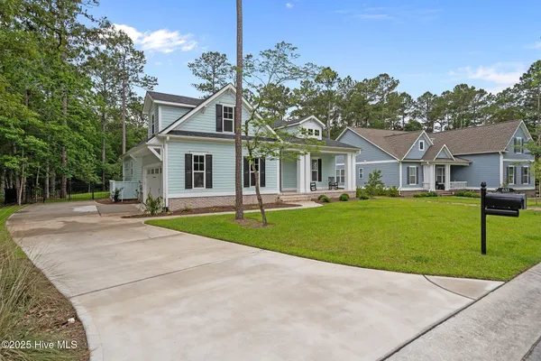 $634,900 | 633 Ashbury Drive Southeast, Bolivia, NC 28422