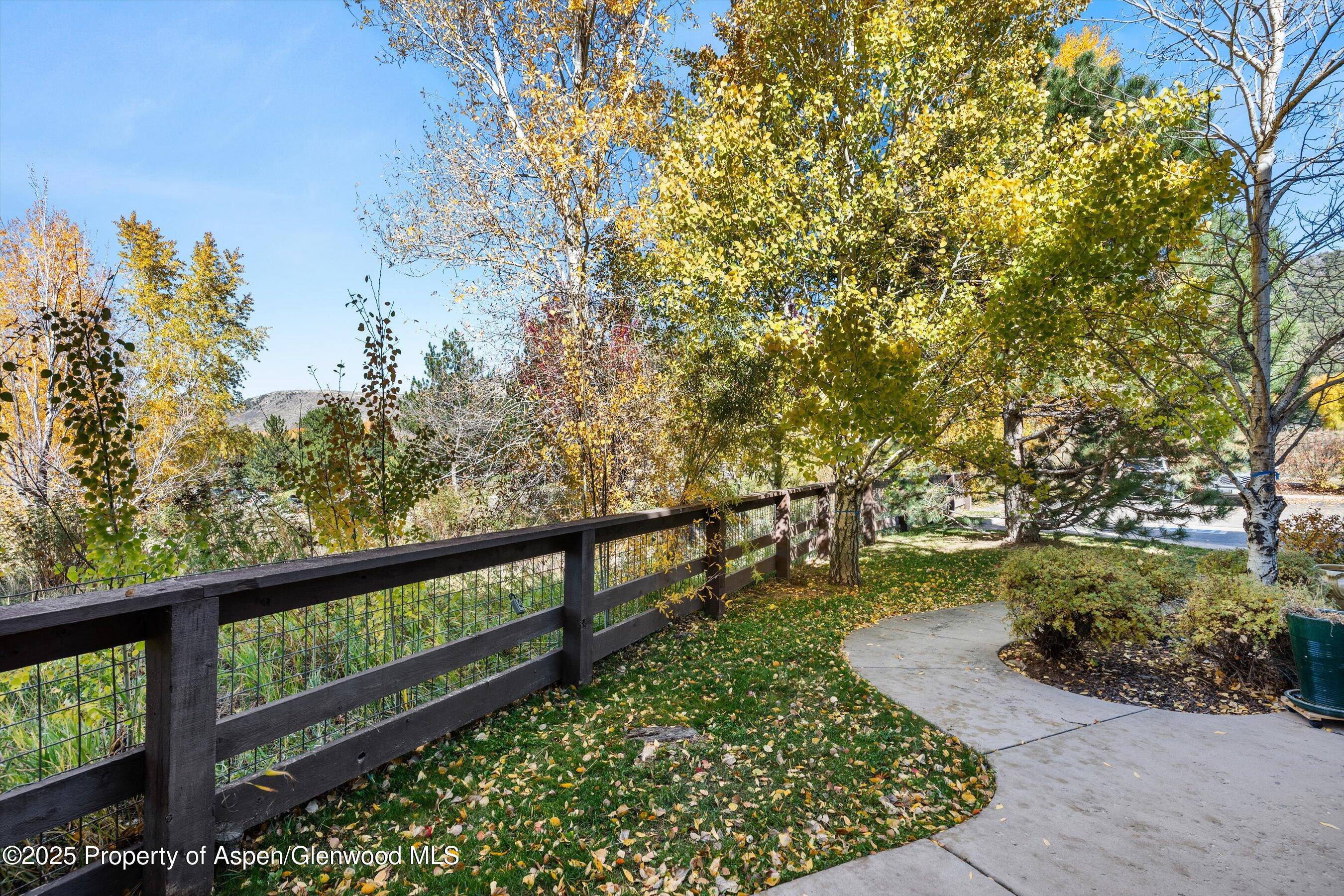 1330 East Valley Road Basalt, CO 81621 - Photo 18 of 18 a view of a garden with wooden fence