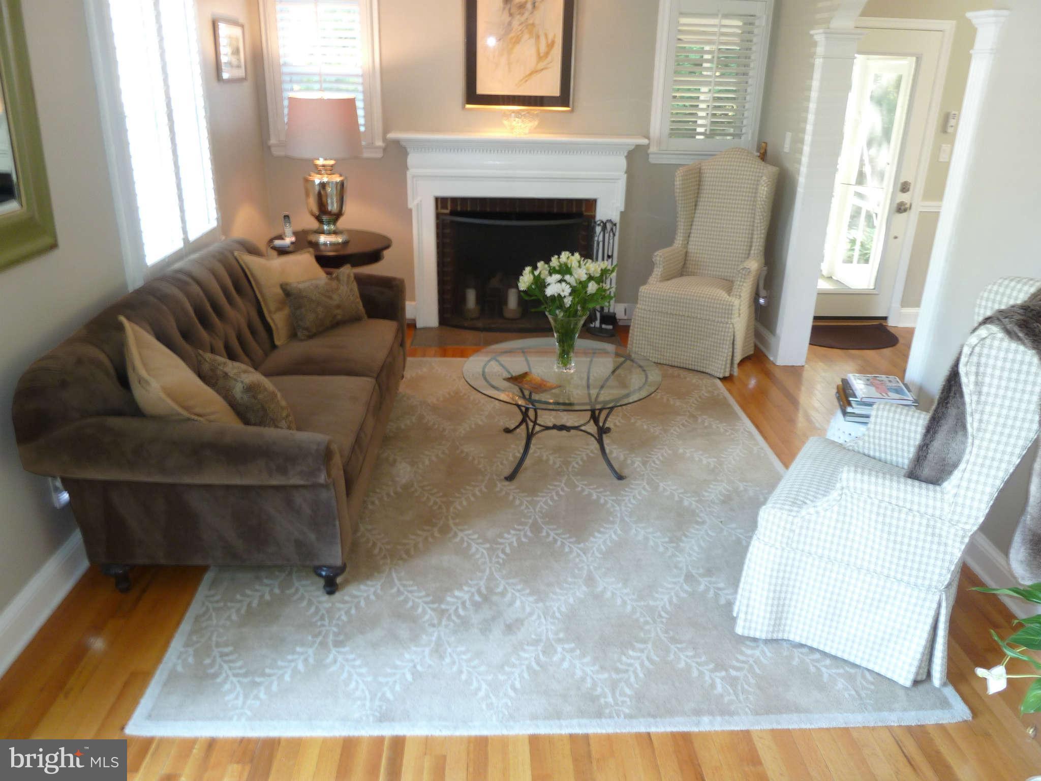 2002 Dayton Street Silver Spring, MD 20902 - Photo 3 of 20 a living room with furniture and a fireplace