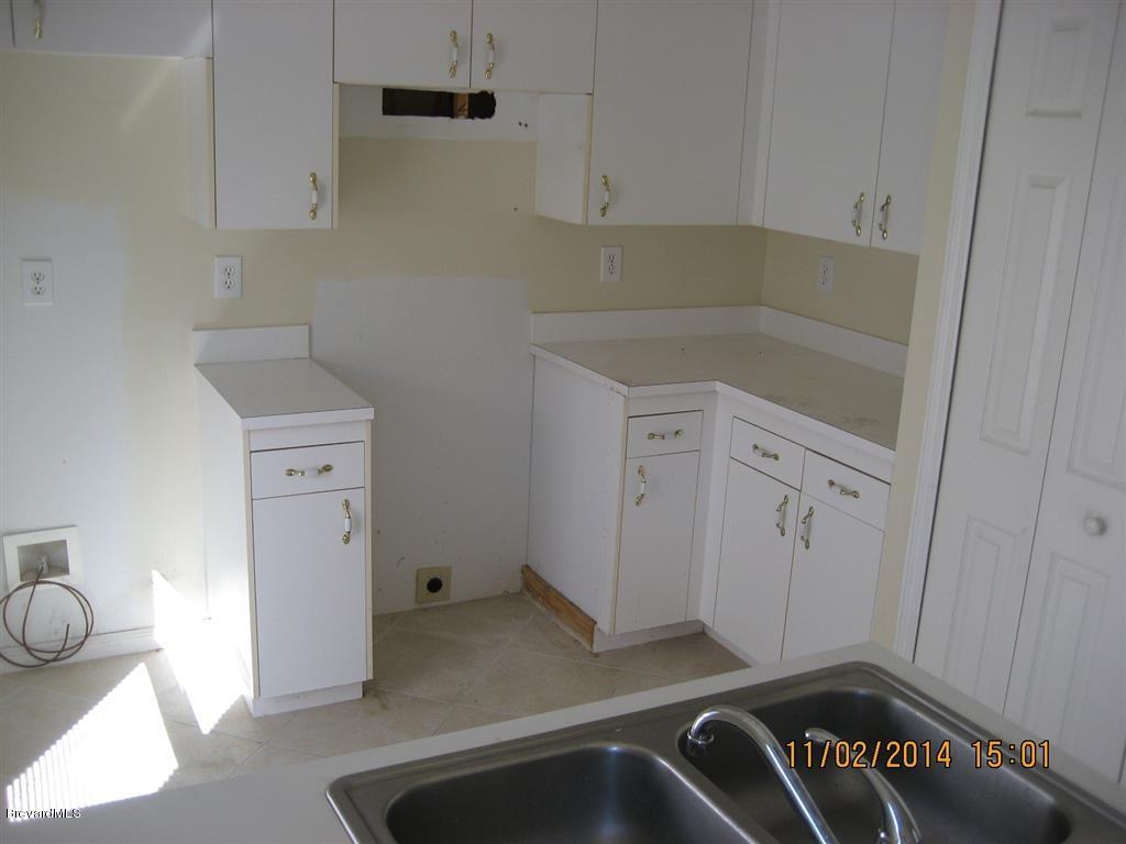 7264 Achilles Road Cocoa, FL 32927 - Photo 4 of 21 kitchen 2